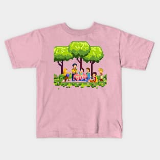 A group of people enjoying a picnic in a park Kids T-Shirt